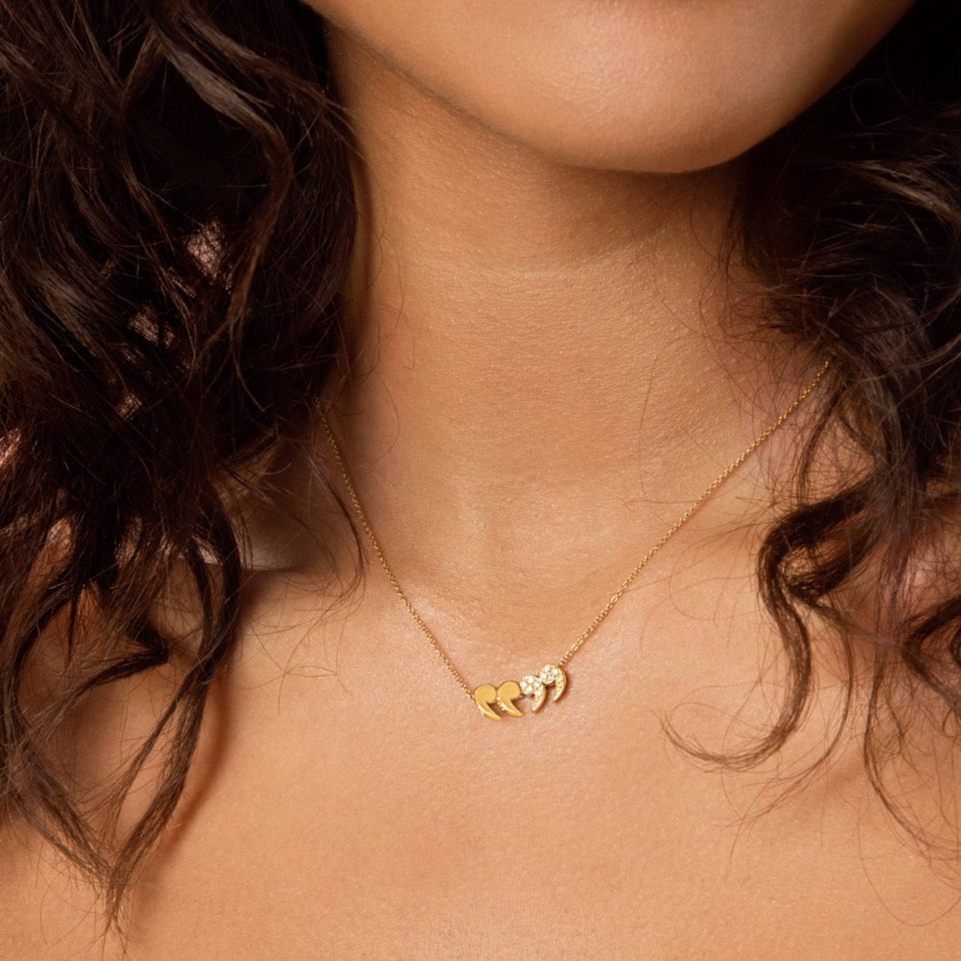 Carolini wearing the Diamond Encrusted "Quote Un-Quote" Necklace one side reversed by McFarlane Fine Jewellery