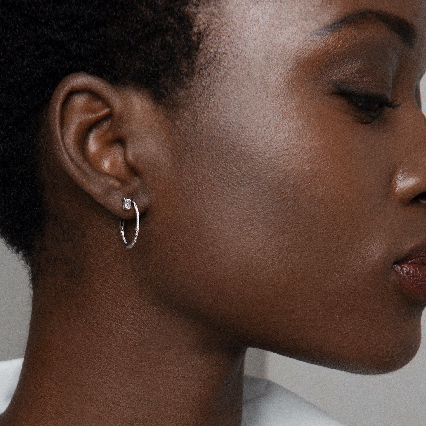 Jennifer wearing our Baguette Diamond Stud and White Gold Diamond Encrusted Hoops by McFarlane Fine Jewellery