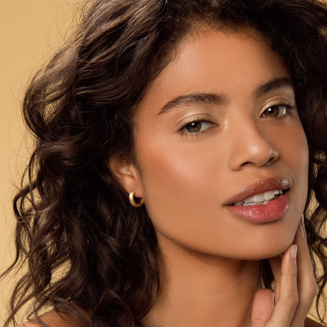 Carolini wearing our Chunky Matt Gold Hoop Earrings by McFarlane Fine Jewellery