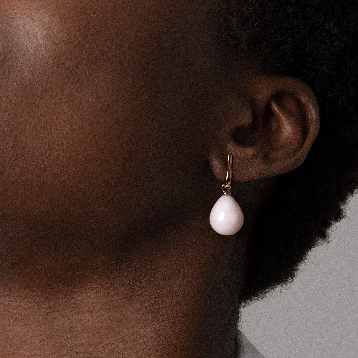 Jennifer wearing our Rose Gold and Pink Peruvian Opal Earrings by McFarlane Fine Jewellery