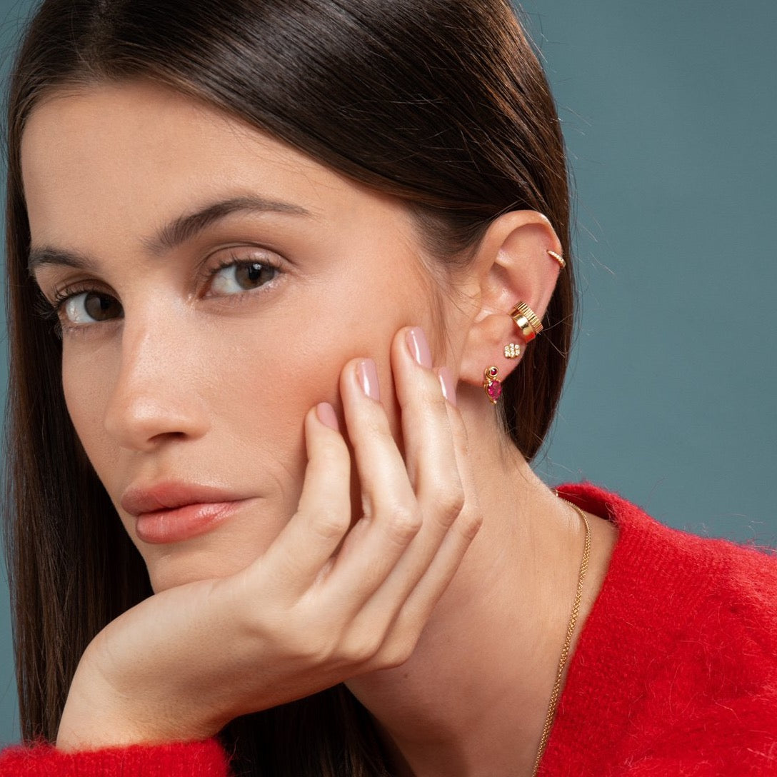 Lilian wearing the Yellow Gold Diamond Huggy Small, the Carved Gold Ear Cuff, the Gold Ear Cuff, the Triple Diamond Bar Studs and the Ruby Stud & Bright Pink Tourmaline Earring Pendant by McFarlane Fine Jewellery