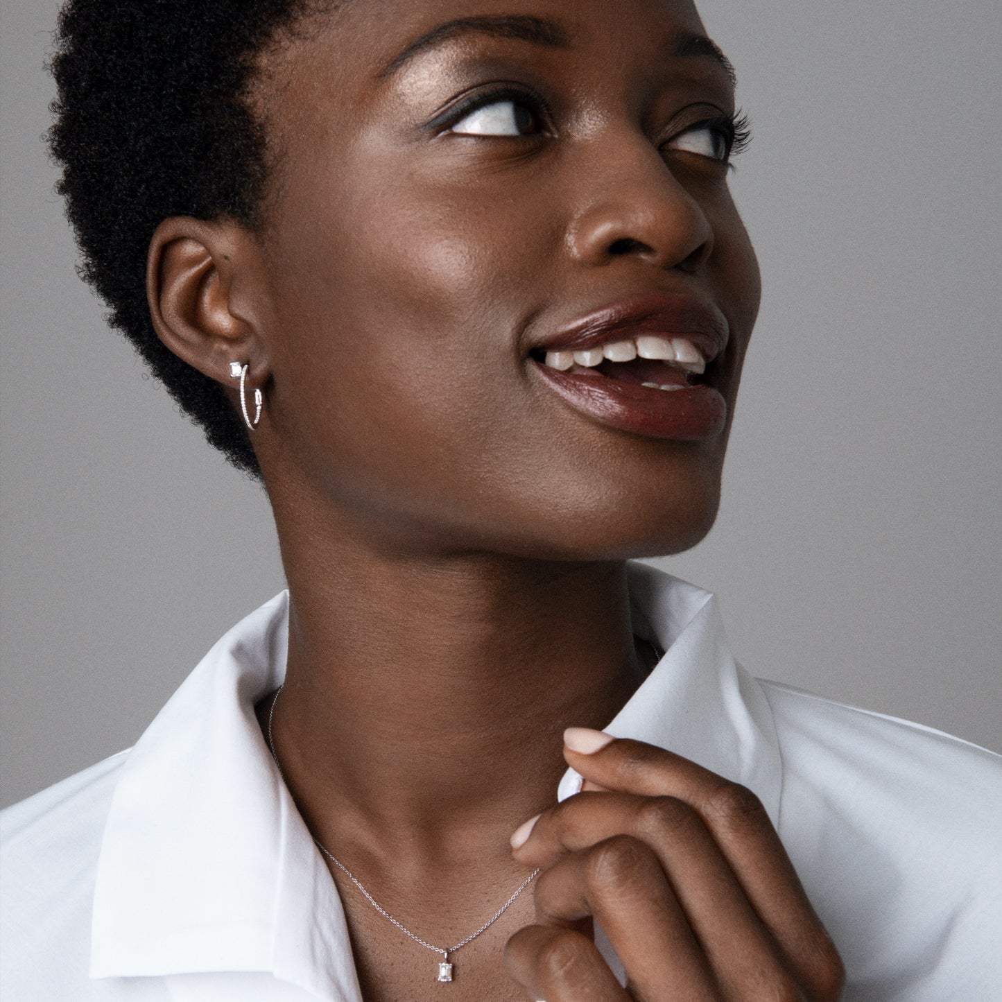 Jennifer wearing our Baguette Diamond Stud, Kimberly Diamond Necklace and White Gold Diamond Encrusted Hoops by McFarlane Fine Jewellery