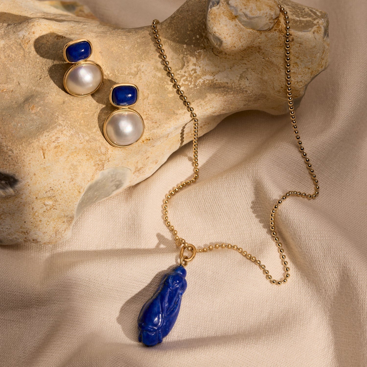 Santorini Earrings and the Wisdom of the apis Lazuli Cicada Necklace by McFarlane Fine Jewellery