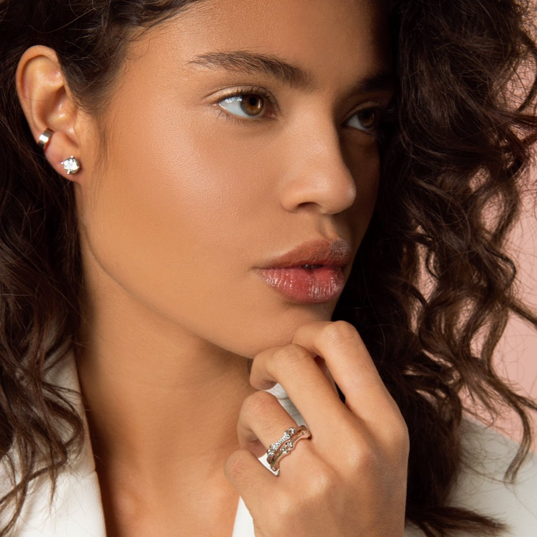 Carolini wearing our White Gold Ear Cuff, White Tourmaline Earrings, White Gold Little Phalanx Ring and Diamond Studded White Gold Little Phalanx Ring by McFarlane Fine Jewellery