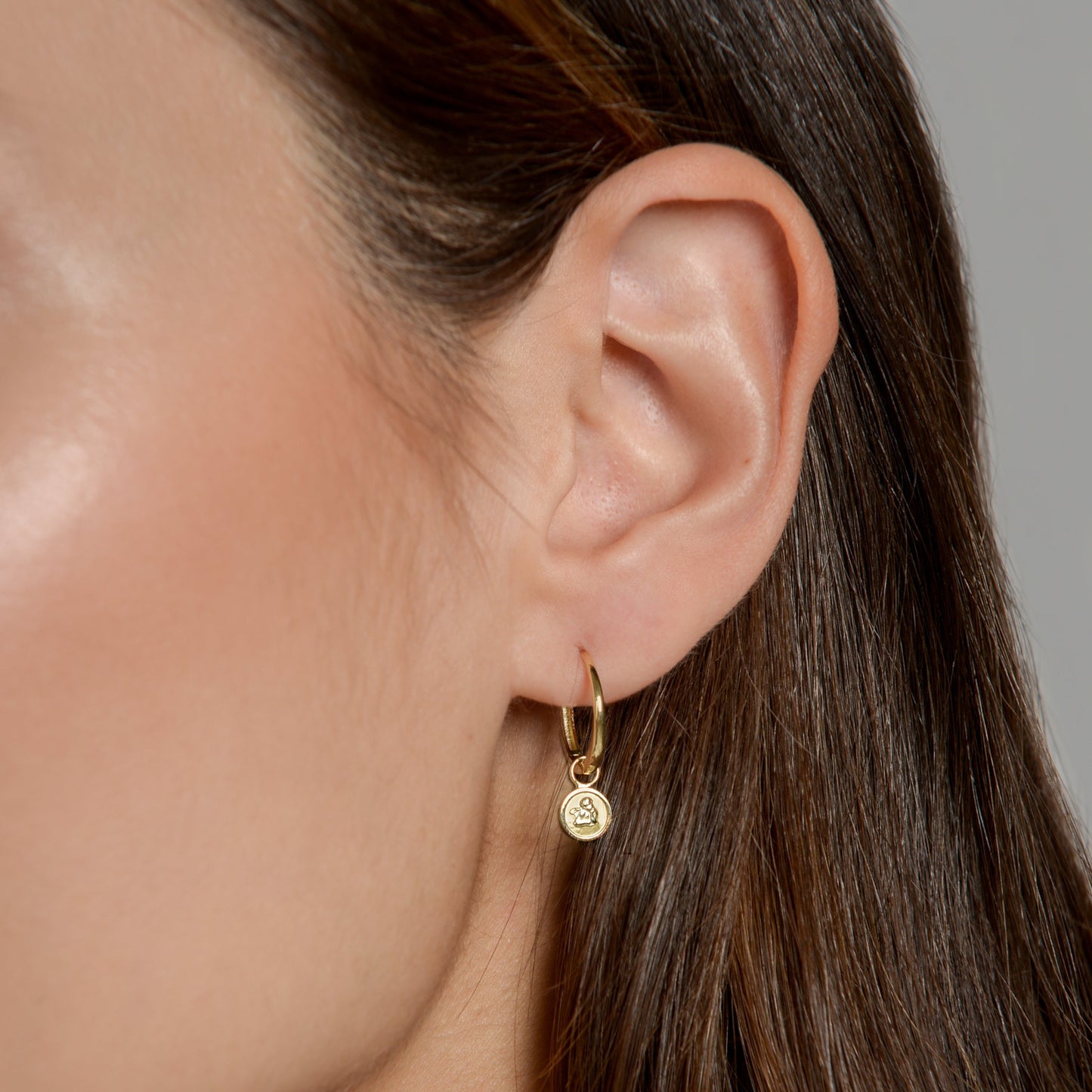 Anna wearing our Angel Earring Pendant with our 18ct Gold Closed Hoop by McFarlane Fine Jewellery