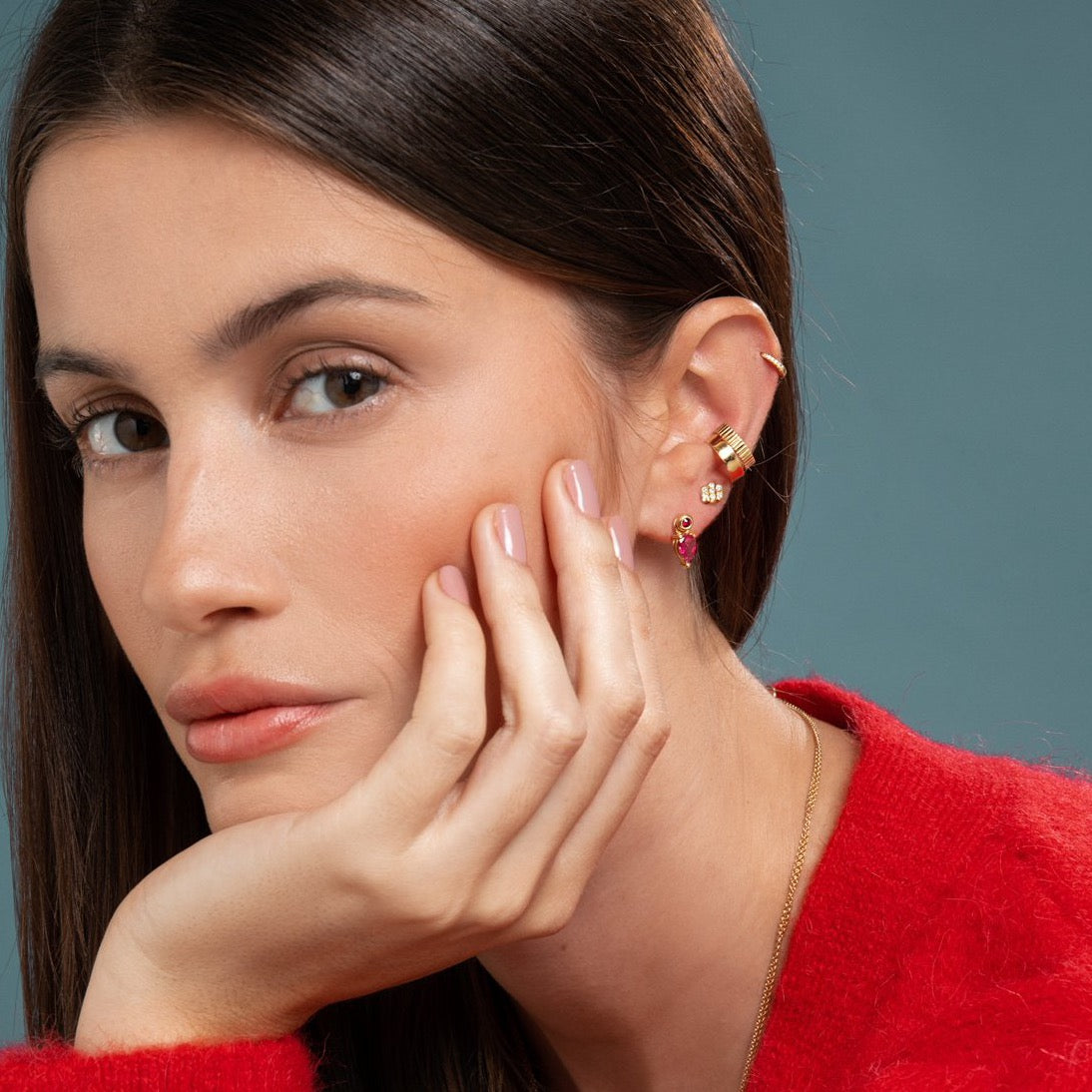 Lilian wearing the Yellow Gold Diamond Huggy Small, Carved Gold Ear Cuff, Gold Ear Cuff, the Triple Diamond Bar Studs and the Ruby Stud and Bright Pink Tourmaline Earring Pendant by McFarlane Fine Jewellery